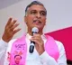 Uttam Kumar Reddy came with suitcase says Harish Rao