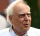 There is no intention to criticise Gandhis family says Kapil Sibal