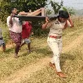 Kasibugga SI Sirisha carries an unidentified man dead body for two kilometers