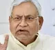 Protesters throws chappals on to Nitish Kumar
