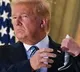 Trump Removes Mask