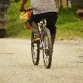 65 year old man rides cycle abou 70 kilometers for complaint to collector