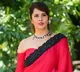 anchor Anasuya looks elegant in her red coloured saree pics