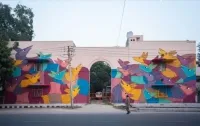 Gond artist Padma Shri Bhajju Shyam partners with Singaporean artist Sam Lo to create one of the tallest mural artworks in Singapore