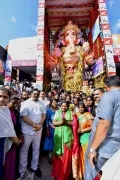 Telangana Governor Tamilisai offered prayers at Khairatabad Ganesh - Photos