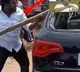 Buddha Venkanna shows his swollen hand to media