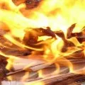 Currency Notes burned on Road