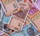 Currency notes in front of houses Chennai people shoking