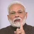 One need not fear and spread rumours over corona says Modi