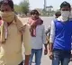 Youth walking to reach home town amid corona virus fear