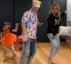 Warner and family dance again for a popular song