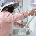 Rice ATM feeds Vietnams poor amid lockdown