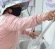 Rice ATM feeds Vietnams poor amid lockdown