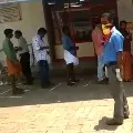 Customers Queue in front of Kerala Wines Shop