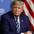 Donald Trump signs immigration order featuring numerous exemptions