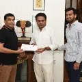 Producer Dil Raju met KTR and handed over Rs 10 lakhs cheque to the CM Relief Fund