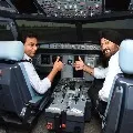 KTR experiences flight simulator at Shamshabad