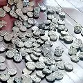 Antique silver coins found while flattening the farm in Vikarabad