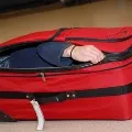 Teenager Takes Boy Friend in Suit Case to Apartment