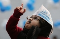 app Invites baby mufflerman for kejriwal oath ceremony