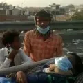 Injured Child On Make Shift Stretcher
