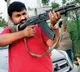 Hyderabad corporators husband holds AK 47