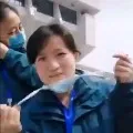 Chinese doctors celebrate closure of the last temporary hospital in Wuhan